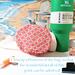 The bottom of an orange and white print water bottle bag is displayed with a Stanley Quencher 40 ounce, a cell phone, money and chap stick.
